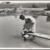 Drinking water for field worker's family. Imperial Valley, California, near El Centro