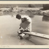 Drinking water for field worker's family. Imperial Valley, California, near El Centro