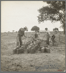 Making adobe bricks. Bosque Farms project, New Mexico. These bricks are to be used in construction of the new school building