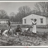 El Monte federal subsistence homesteads. Four-bedroom house. Eight in family, six boys, aged one to fourteen. Father is conductor (streetcar), one hundred dollars monthly. Pays sixteen dollars and twenty cents a month rent on purchase. California