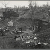 Migrant workers' camp, outskirts of Marysville, California. The new migratory camps now being built by the Resettlement Administration will remove people from unsatisfactory living conditions such as these and substitute at least the minimum of comfort and sanitation. April 1936