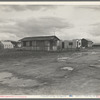 Street and homes in "Little Oklahoma." Forty families in this group. Tents, tent houses, shacks, freight cars converted into homes