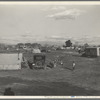 Hooverville of Bakersfield, California. A rapidly growing community of people living rent-free on the edge of the town dump in whatever kind of shelter available. Approximately one thousand people now living here and raising children