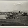 Hooverville of Bakersfield, California. A rapidly growing community of people living rent-free on the edge of the town dump in whatever kind of shelter available. Approximately one thousand people now living here and raising children