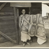Grandmother from Oklahoma and her pieced quilt. California, Kern County