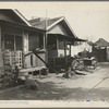 Mexican quarter of Los Angeles, California. Average rental is eight dollars. Some houses have plumbing
