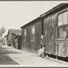 Mexican quarter of Los Angeles. One quarter mile from City Hall. Area has been condemned and will be torn down shortly to make space for the new Union Railroad station. Average rent is eight dollars