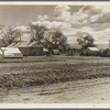 Kern County camp for migrants. Planned and erected by the Resettlement Administration fifteen miles out of Bakersfield, California. Partially occupied because there is not any work in the fields