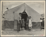 Migrant family in Kern County. This family was sent back at the state line by the Los Angeles police. Refused entrance into California, and it was only after they had gone back to Arkansas to borrow fifty dollars ... that they were permitted to enter