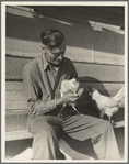 Rural rehabilitation client. San Fernando Valley, California. Chicken farmer making good on rural resettlement loan. Selling case of eggs a day. On state emergency relief administration job before loan