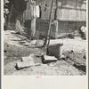 Home of Mexican field worker showing water supply. Brawley, Imperial Valley, California