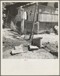 Home of Mexican field worker showing water supply. Brawley, Imperial Valley, California