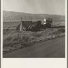 Transient potato workers camping along the highway. Near Shafter, California