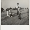 Example of self-resettlement in California. Oklahoma farm family on highway between Blythe and Indio