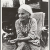 Mother of family camped near a creek bed, panning for gold. "Slept in a bed all my life long till now--sleeping on the ground." Near Redding, California