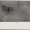 Dust storm. It was conditions of this sort which forced many farmers to abandon the area. Spring 1935. New Mexico