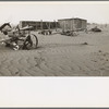 These farm implements should never have been used for they destroyed a naturally rich grazing area. Mills, New Mexico