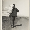 Migrant worker on California highway.