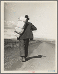 Migrant worker on California highway.