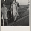 Children of Oklahoma drought refugees on highway near Bakersfield, California. Family of six; no shelter, no food, no money and almost no gasoline. The child has bone tuberculosis