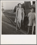 Children of Oklahoma drought refugees on highway near Bakersfield, California. Family of six; no shelter, no food, no money and almost no gasoline. The child has bone tuberculosis