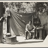 Jack Neill, "migratory fruit tramp," on banks of Pulah Creek near Winters, California. He owns one acre subsistence farm near Porterville ...
