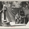 Jack Neill, "migratory fruit tramp," on banks of Pulah Creek near Winters, California. He owns one acre subsistence farm near Porterville ...