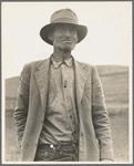 This man is a labor contractor in the pea fields of California. "One-Eye" Charlie gives his views. "I'm making my living off of these people (migrant laborers) so I know the conditions." San Luis Obispo County, California