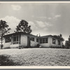 Hightstown, New Jersey. The model house nears completion. Note landscaping