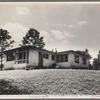 Hightstown, New Jersey. The model house nears completion. Note landscaping