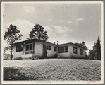 Hightstown, New Jersey. The model house nears completion. Note landscaping