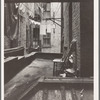 Out of rear window tenement dwelling of Mr. and Mrs. Jacob Solomon, 133 Avenue D, New York City. The Solomon family are all on the accepted list for resettlement at Hightstown, New Jersey