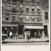 Background photo for Hightstown project. The present home of Mr. and Mrs. Jacob Solomon and family, 133 Avenue D, New York City. This family is included in the first unit of thirty-five families to be resettled at Hightstown in July, 1936 ...