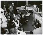 Harold Prince indicating set design maquette during rehearsals for the stage production Follies