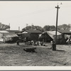 Housing for migratory cotton workers five miles north of Corcoran, California. The famous strikers' concentration camp in 1933 was in Corcoran