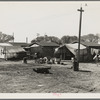 Housing for migratory cotton workers five miles north of Corcoran, California. The famous strikers' concentration camp in 1933 was in Corcoran