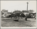 Housing for migratory cotton workers five miles north of Corcoran, California. The famous strikers' concentration camp in 1933 was in Corcoran