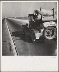 Drought refugee's car on U.S. Highway 99 between Bakersfield and Famoso, California. Note: the photographer passed twenty-eight cars of this type (drought refugees) between Bakersfield and Famoso, thirty-five miles, between 9:00 and 9:45 in the morning