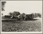 Squatter camp. Outskirts of Bakersfield, California. Note number of auto trailers and trailer being constructed on left