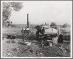 Migratory workers' "kitchen" near Shafter. Kern County, California. Squatters' camp