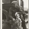 1936 drought refugee from Polk, Missouri. Awaiting the opening of orange picking season at Porterville, California