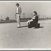 Young family, penniless, hitchhiking on U.S. Highway 99, California. The father, twenty-four, and the mother, seventeen, came from Winston-Salem, North Carolina, early in 1935