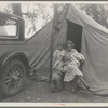 Mother and three children in a California squatter camp