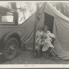 Mother and three children in a California squatter camp