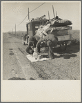 Missouri family of five, seven months from the drought area, on U.S. Highway 99 near Tracy, California