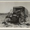 Texan refugees' car. They are seeking work in the carrot fields of the Coachella Valley. California