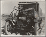 Texan refugees' car. They are seeking work in the carrot fields of the Coachella Valley. California