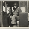 Carrot pullers from Texas. Texas farmer on edge of carrot field. In California for two weeks, migrating after three years of crop failures. Combined earnings, man and wife tying carrots: One dollar and twelve cents a day