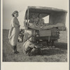 Family between Dallas and Austin, Texas. On their way to the Arkansas cotton fields. 1936