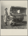 Family between Dallas and Austin, Texas. On their way to the Arkansas cotton fields. 1936